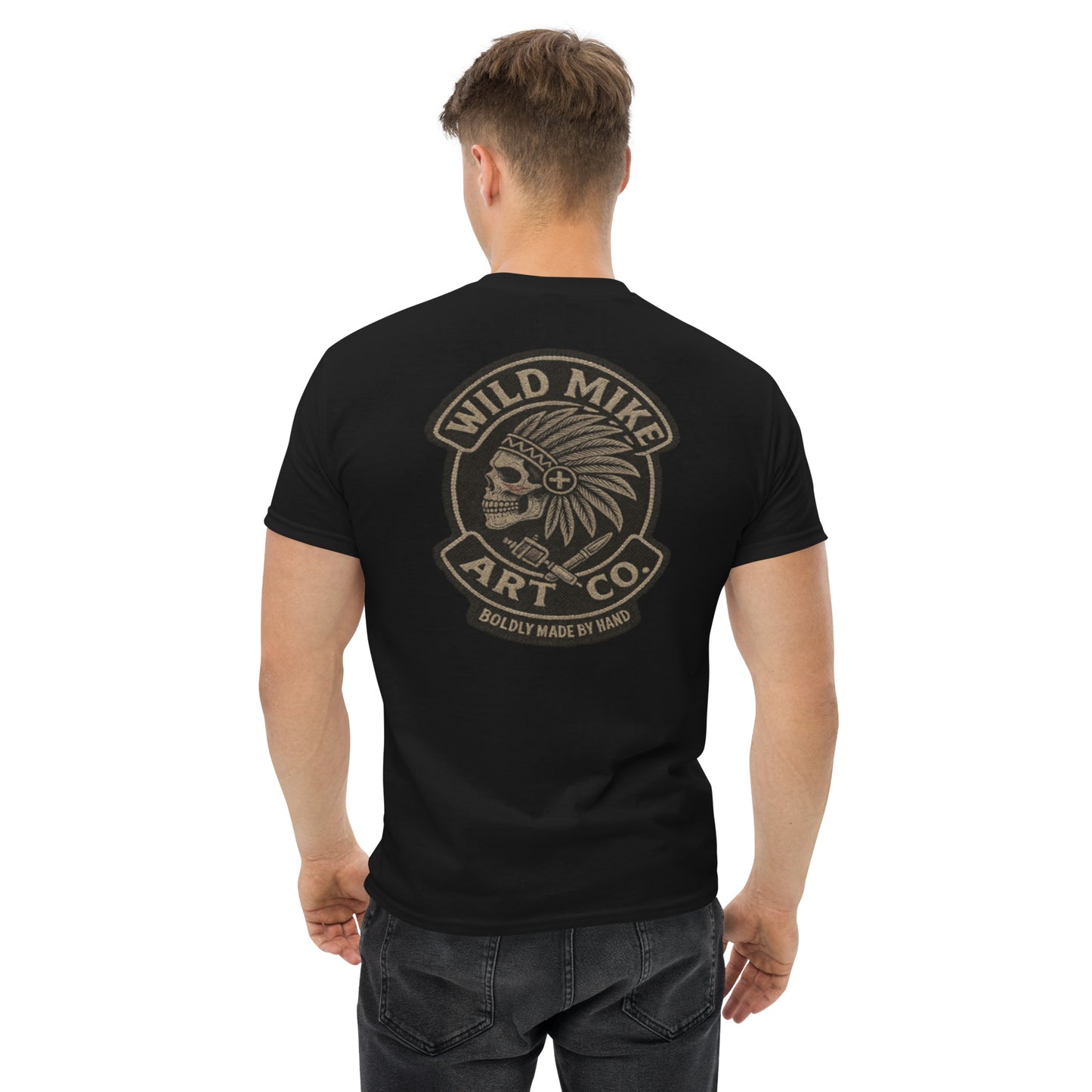 Man wearing a black t-shirt with 'Wild Mike Art Co.' logo on the back, on a white background